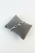 infinity silver bangle
