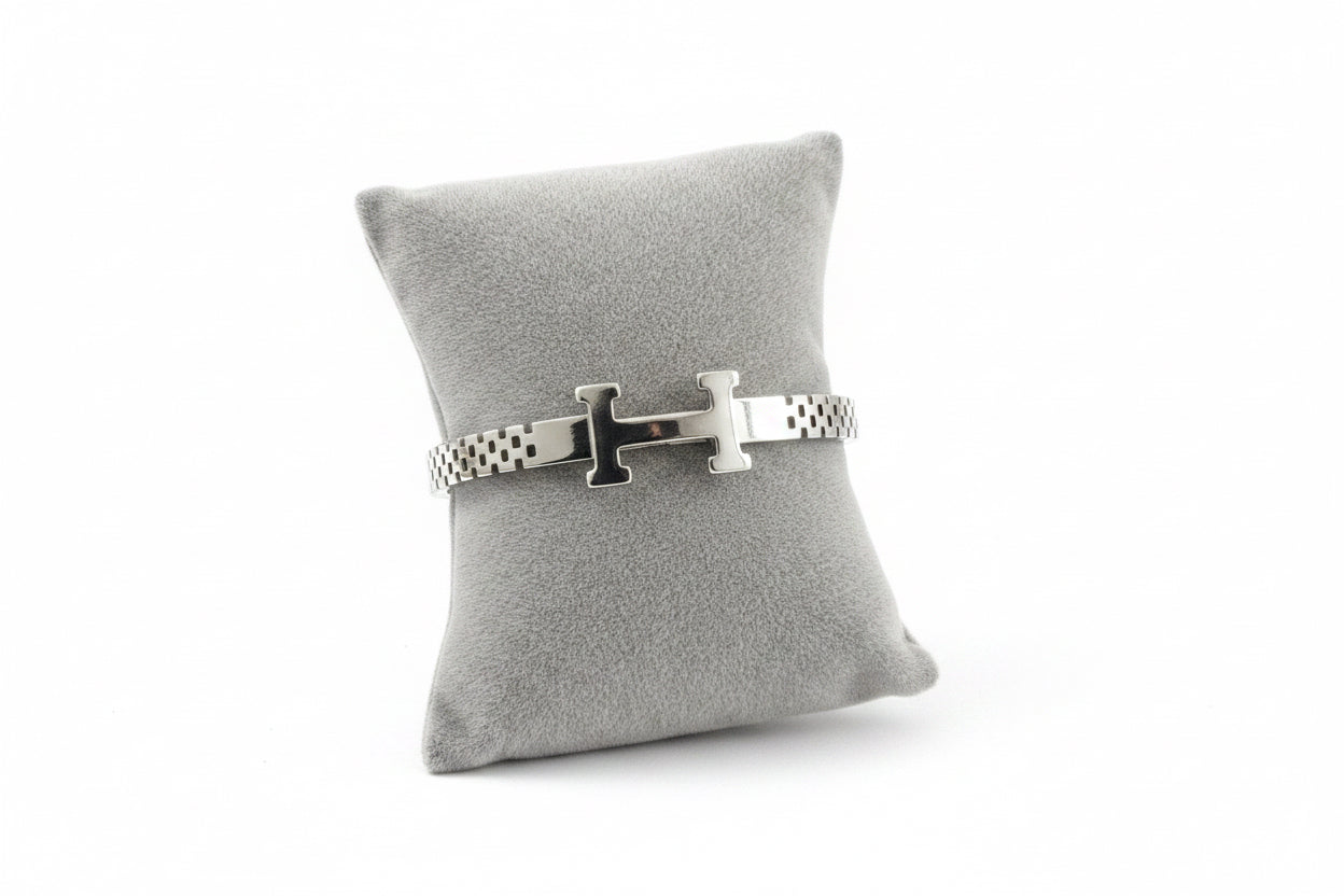 Silver H bangle