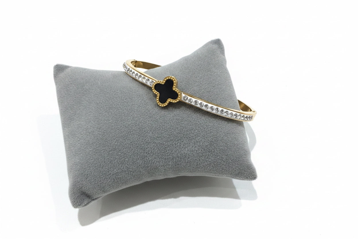 Gold and Black clover bangle ￼