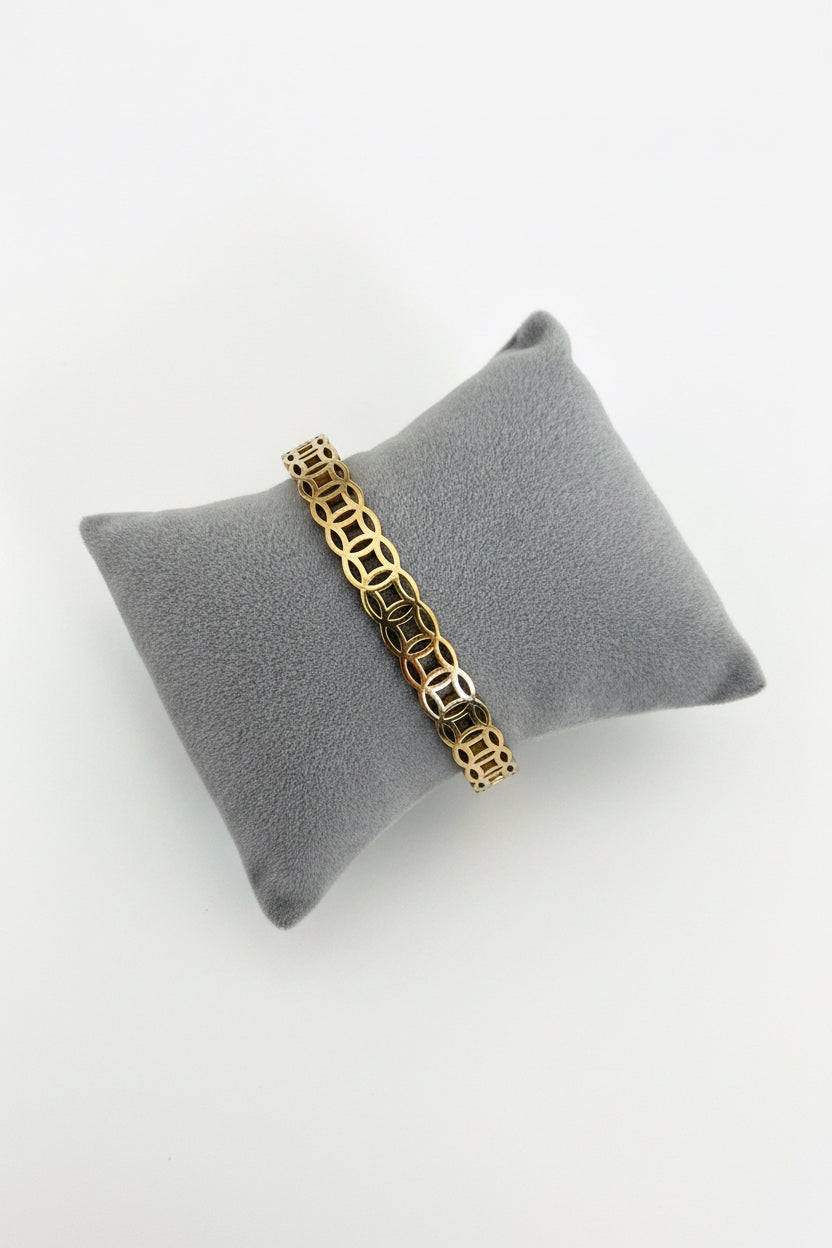 Intricate gold bangle ￼