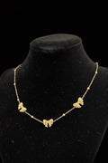 Gold bow necklace ￼