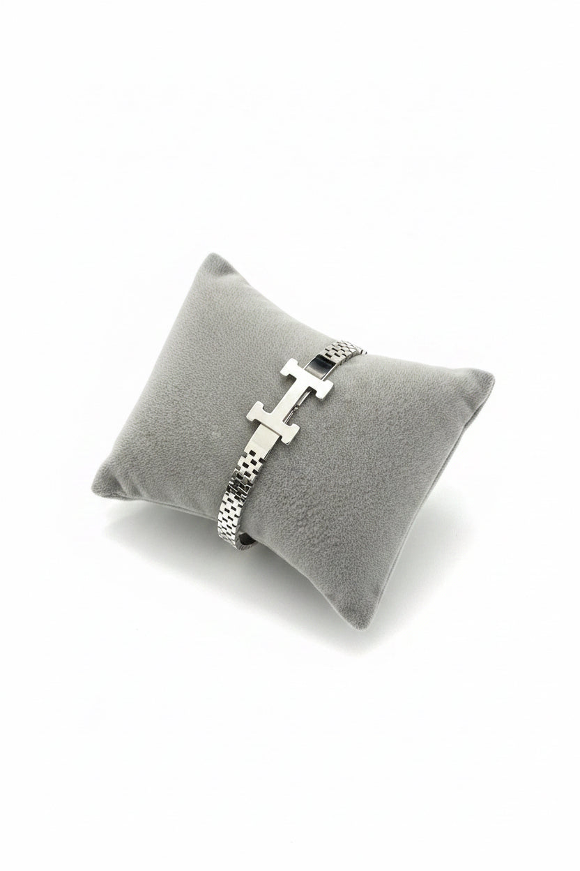 Silver H bangle